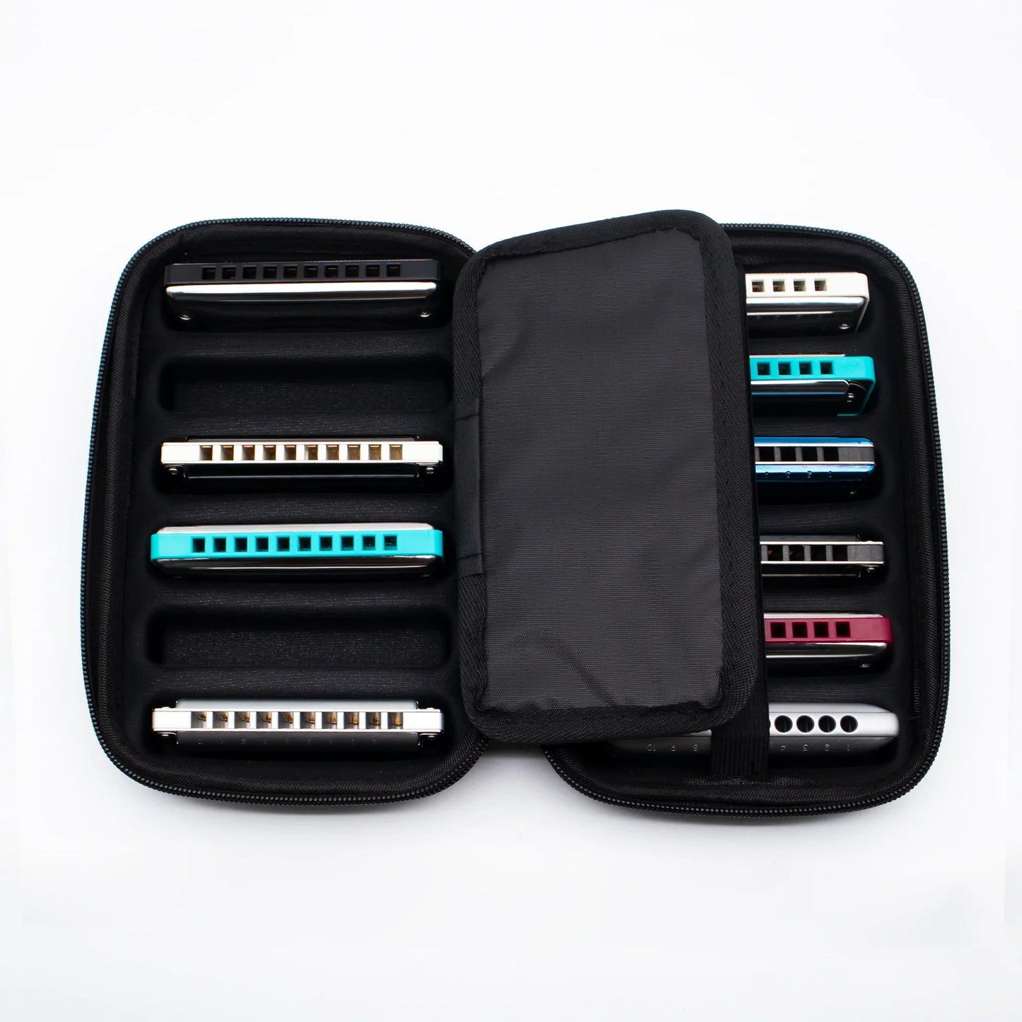 KONGSHENG hard case opened showing harmonicas arranged inside
