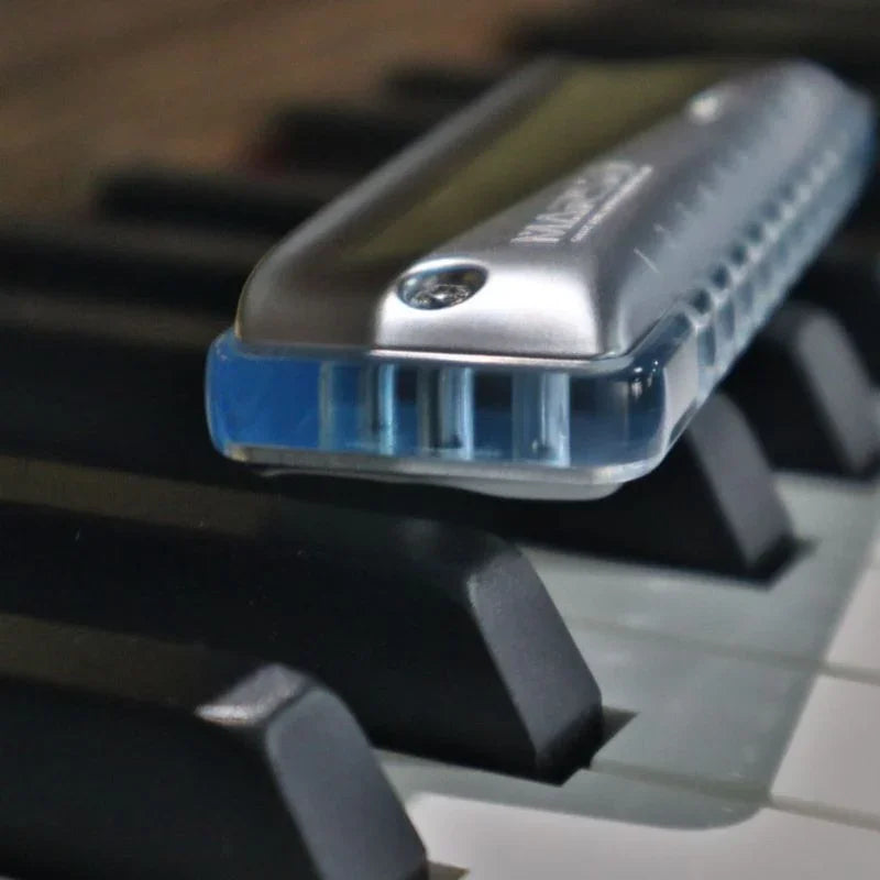 KONGSHENG MarsM2 harmonica on piano keys