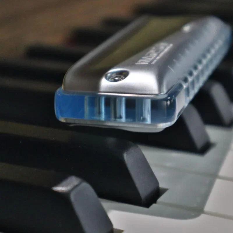 KONGSHENG MarsM2 harmonica on piano keys