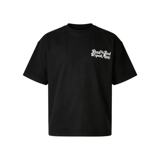 Black T-shirt with 'Reed by Reed We speak Music' text, stylish music-themed apparel